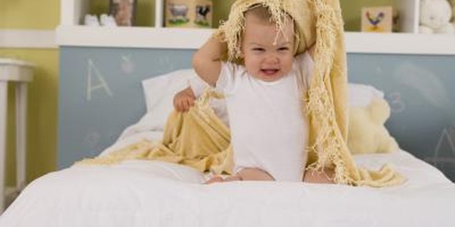 Comstock Images/Comstock/Getty Images A convertible toddler bed grows with your child.