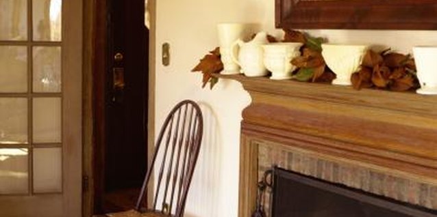Creatas Images/Creatas/Getty Images By restaining a mantel, you can restore its beauty.