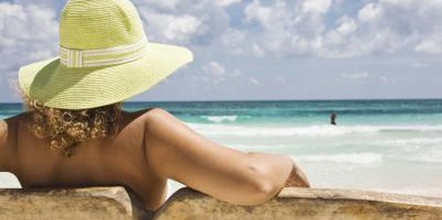 Jupiterimages/Brand X Pictures/Getty Images Relax and cool off while looking hot with beach accessories that suit your style.