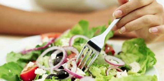 George Doyle/Stockbyte/Getty Images You can make an entree salad satisfying and low in calories.