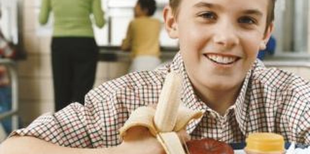Digital Vision./Digital Vision/Getty Images Fruit and other healthy sides can make sandwiches into satisfying lunches.