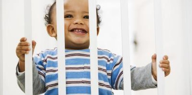 BananaStock/BananaStock/Getty Images A playpen is a safer alternative to a walker.