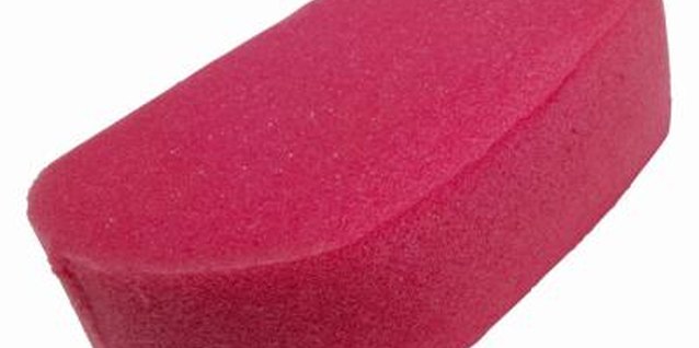 Stockbyte/Stockbyte/Getty Images Use a bath sponge to make larger paw print stamps.