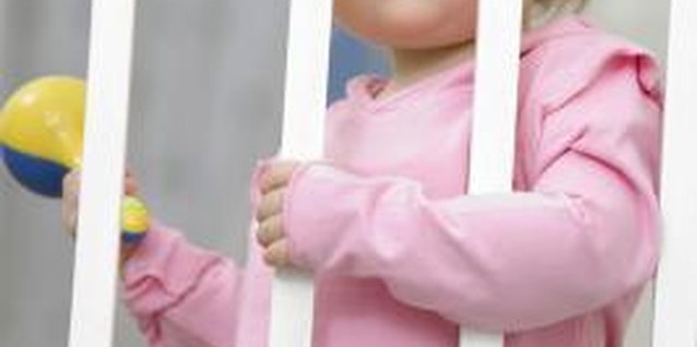 BananaStock/BananaStock/Getty Images Rattles make noise, withstand chewing and work those fine motor muscles.