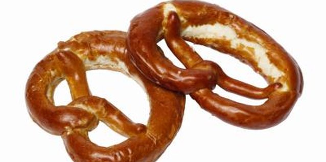 Stockbyte/Stockbyte/Getty Images Lye is what typically gives a pretzel a crunchy crust.