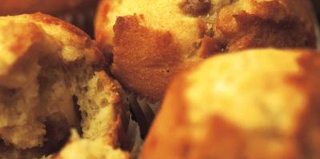 Stockbyte/Stockbyte/Getty Images Buttermilk and other acidic ingredients help produce light, fluffy muffins.