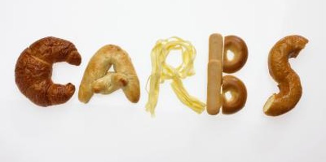 Brand X Pictures/Brand X Pictures/Getty Images Producing energy is an essential role of carbohydrates in your diet.