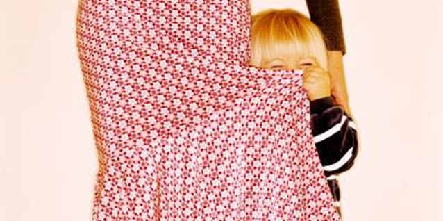 Stockbyte/Stockbyte/Getty Images He may want to hide behind you, but help him feel braver instead.
