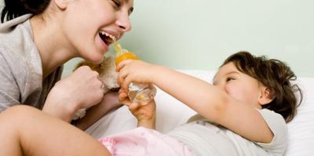 Thinkstock Images/Comstock/Getty Images Slowly diluting her bottle of milk with water makes it less appealing.