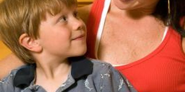 Jupiterimages/Photos.com/Getty Images Reading to your child is an effective way to get involved in his education.