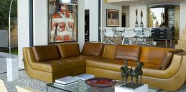 Goodshoot/Goodshoot/Getty Images Combing both masculine caramel browns and feminine light yellow colors create dynamic spaces.