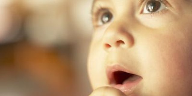 Hemera Technologies/AbleStock.com/Getty Images A toddler with severe cognitive delays can often learn to communicate.