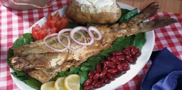 Jupiterimages/liquidlibrary/Getty Images If you want rustic appeal and full flavor, go with catfish.