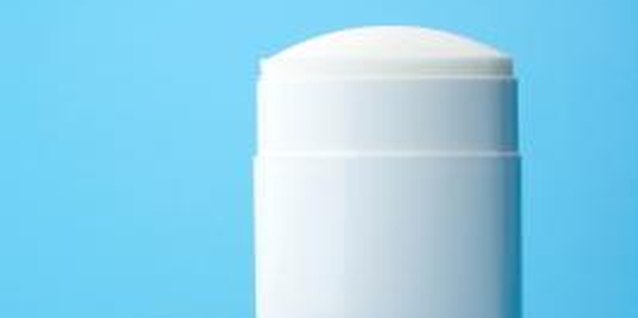 Jupiterimages/Photos.com/Getty Images Wearing an undershirt may protect your cashmere sweater from deodorant stains.