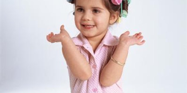 Creatas/Creatas/Getty Images Sponge rollers are gentle on a child's hair.