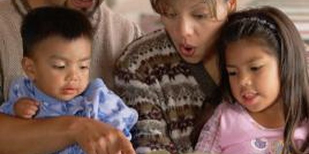 Brand X Pictures/Brand X Pictures/Getty Images Read the Bible stories with enthusiam to keep your toddler excited.