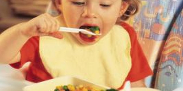 Comstock/Comstock/Getty Images Transform your toddler's highchair into an enjoyable craft area.