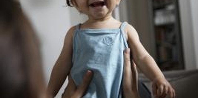 Rayes/Lifesize/Getty Images Show her how to laugh at the world around her.