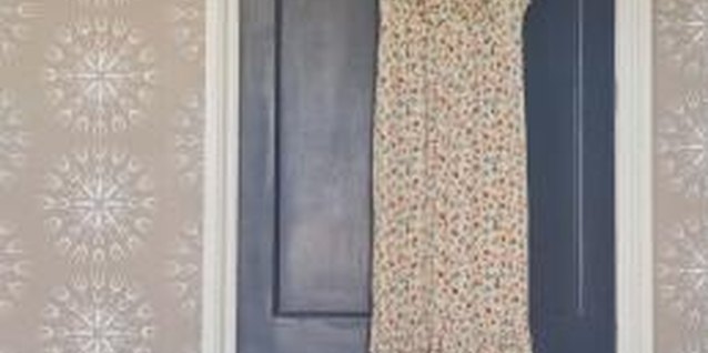 Jupiterimages/Polka Dot/Getty Images Get the look of wallpaper without the investment using decorative stamping.
