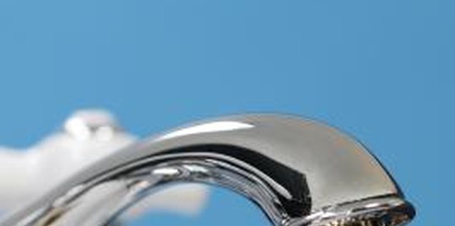 Comstock/Comstock/Getty Images When a laundry faucet drips, it usually needs a new washer.