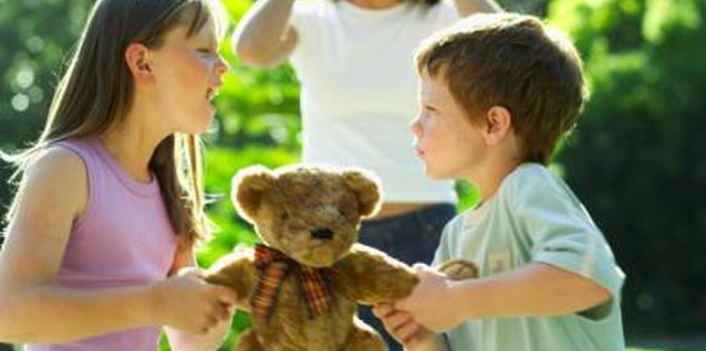 Stockbyte/Stockbyte/Getty Images Teaching conflict resolution skills helps your kids solve their own problems.