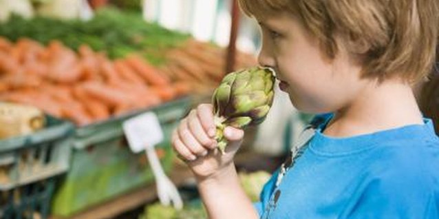 Jupiterimages/BananaStock/Getty Images Let your child make a scratch-and-sniff poster using fruit.
