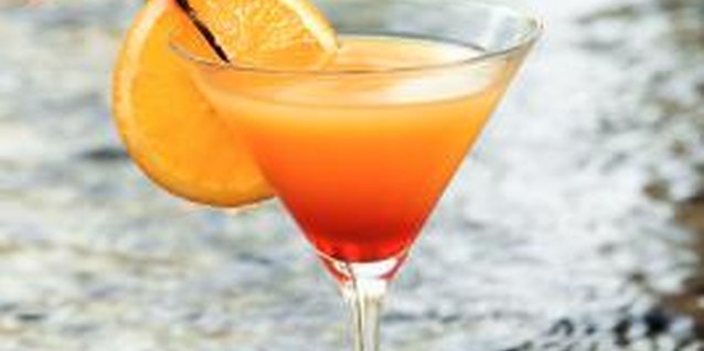 Jupiterimages/Photos.com/Getty Images Orange schnapps blends with a variety of liguors and juices to create tasty mixed drinks.