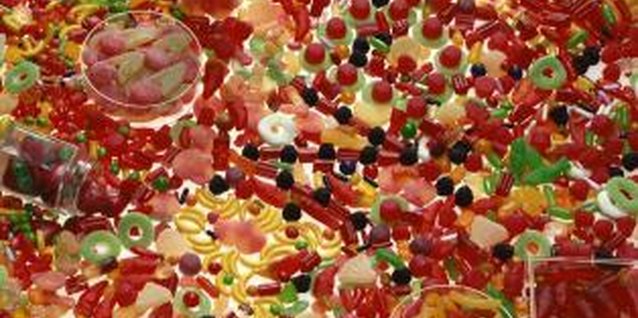 Jupiterimages/Comstock/Getty Images Gummy candies can represent bugs or worms in your dirt dessert.