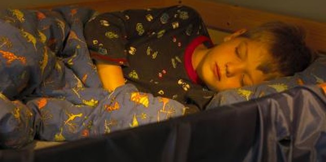 BananaStock/BananaStock/Getty Images Bunk beds don't have to get in the way of a good night's sleep.