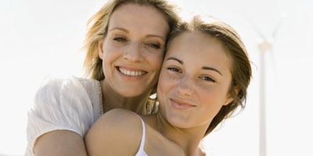 Jupiterimages/Goodshoot/Getty Images Bonding with an adopted teen girl can take hard work, but it's typically well worth the effort.