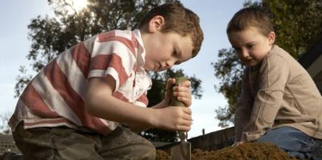 Steve Baccon/Photodisc/Getty Images Do something with your dirt pile before your kids do.