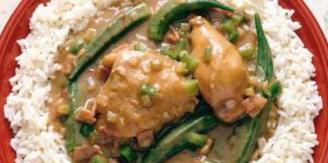 Jupiterimages/Photos.com/Getty Images Bone-in pieces are best for chicken fricassee.