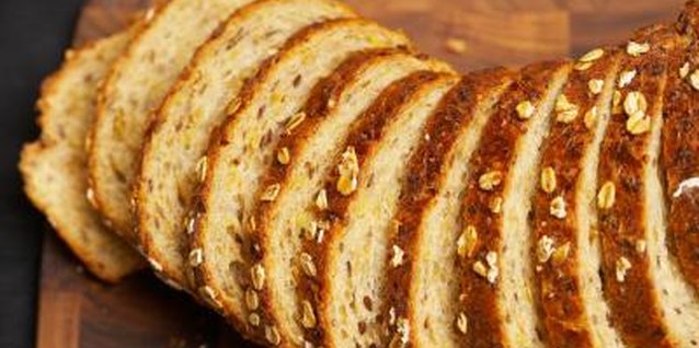 Jupiterimages/Photos.com/Getty Images According to the food pyramid, at least half of all your grains should be whole grains.