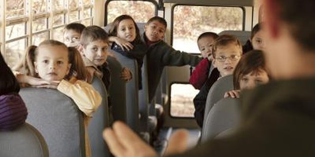 Comstock/Comstock/Getty Images Sitting quietly on the bus is an important field trip safety rule.
