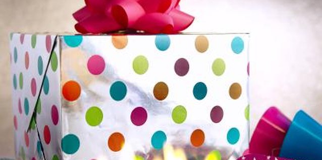 Photos.com/AbleStock.com/Getty Images Craft simple, yet colorful, first birthday centerpieces.