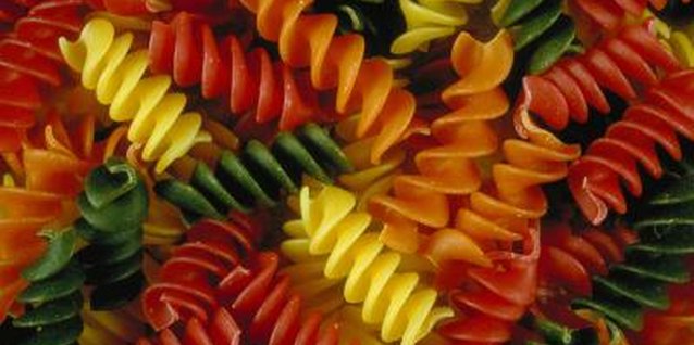 Jupiterimages/Photos.com/Getty Images Choose pasta in a wide variety of colors to make crafts more interestesting.