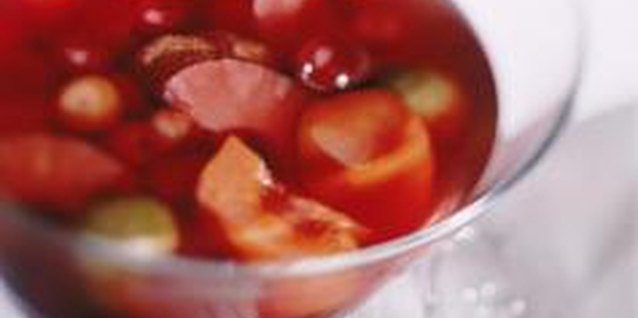 John Foxx/Stockbyte/Getty Images Fruit punch with fruit slices is a healthy drink alternative to soda.