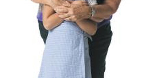 Photodisc/Photodisc/Getty Images Even if you can't always be there for hugs, you can forge a healthy long-distance relationship.