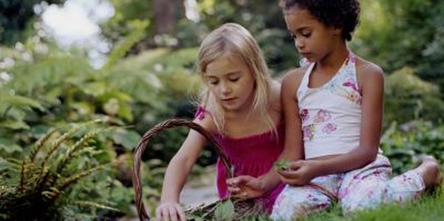 Nick White/Digital Vision/Getty Images Care should be taken when choosing fertilizers for yards where children play.