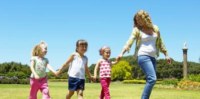 Kane Skennar/Digital Vision/Getty Images Having a nanny who can drive means entertaining trips to the park.