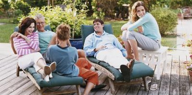 Digital Vision./Photodisc/Getty Images Keep your deck guest-worthy by filling small cracks.