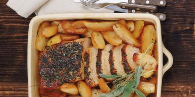 John Foxx/Stockbyte/Getty Images Creative insulation lets you cook a frozen roast in stoneware.