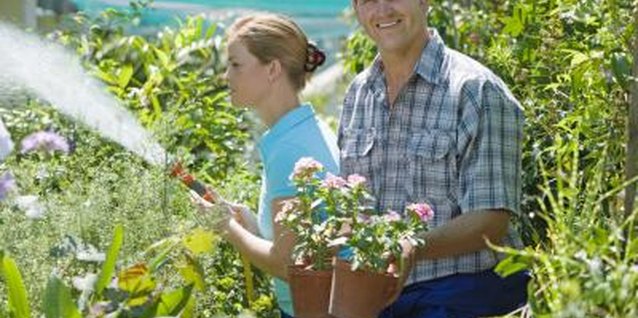 IT Stock Free/Polka Dot/Getty Images The flexibility a garden hose offers often makes it preferable over permanent installations.