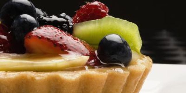Medioimages/Photodisc/Photodisc/Getty Images A glaze adds something extra to a fruit tart.