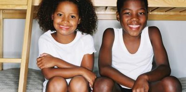 George Doyle/Stockbyte/Getty Images Bunks are generally safe for children ages 6 and older.