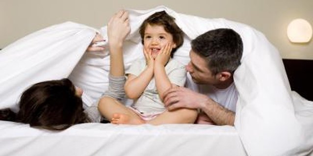 Thinkstock Images/Comstock/Getty Images Transitioning your toddler into his own bed doesn't have to be traumatic.