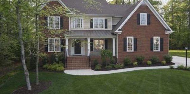 Jupiterimages/Comstock/Getty Images Improved varieties of zoysia grass are deep green and fine-bladed.