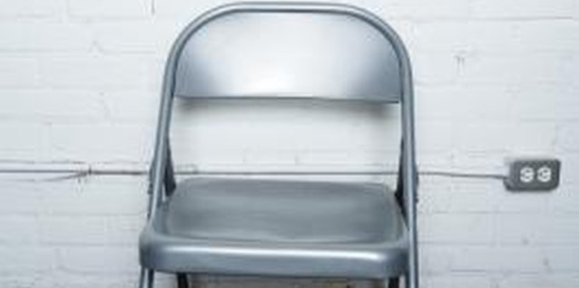 Jupiterimages/Photos.com/Getty Images A little paint can give an old folding chair new life.