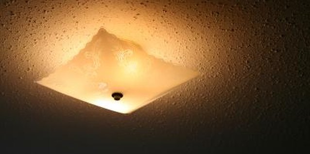 Jupiterimages/Photos.com/Getty Images You can scrape off most ceiling textures, as long as they are asbestos-free.