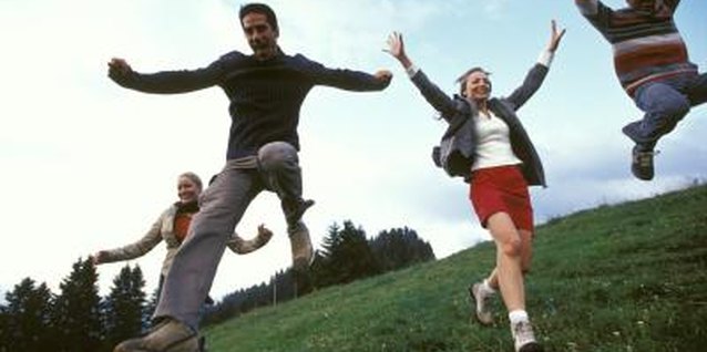 Pixland/Pixland/Getty Images Steep hills require a walk-behind mower or trimmer, rather than a zero-turn.